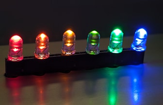 Row of colorful Toricon visible through-hole LEDs